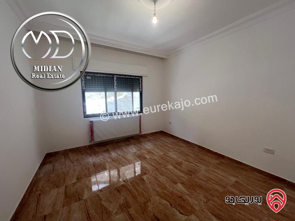 شقة ارضية جديدة فارغة للايجار في عمان - ضاحية الرشيد مساحة 150م مع ترس 50م تشطيبات سوبر ديلوكس بسعر مميز