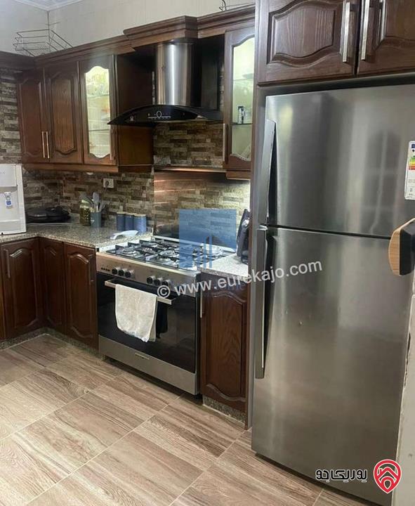 شقة مميزة شبه أرضية مساحة 130م للبيع في عمان - خلدا