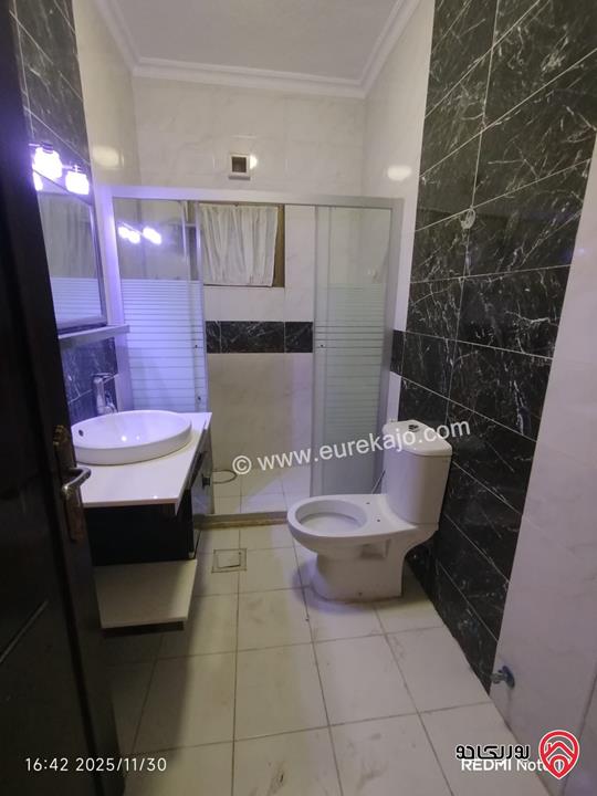 شقة طابق ارضي مساحة 150م داخلي و 70م خارجي وكراج خاص للبيع في عمان - طبربور 