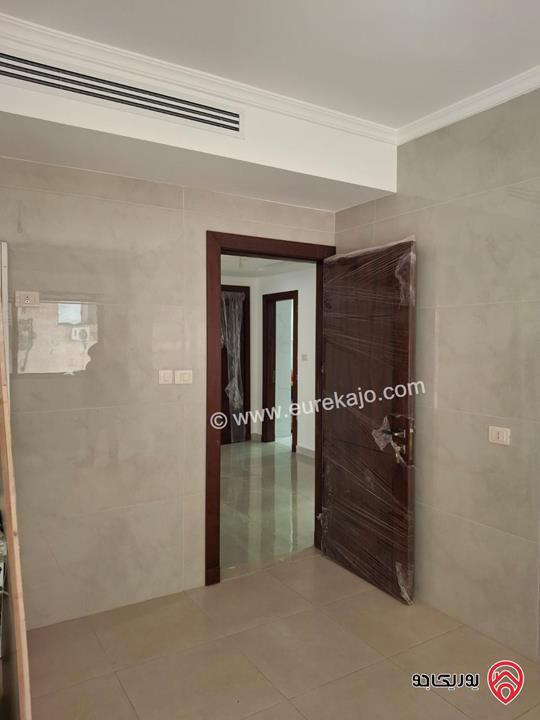 شقة جديدة طابق أول مساحة 180م للبيع في عمان - دير غبار