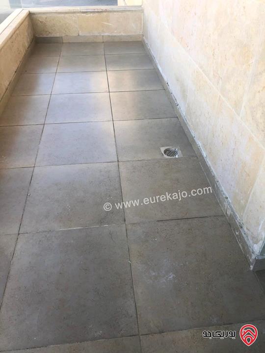 شقة فارغة أرضية مساحة 100م للايجار في عمان - الرابية