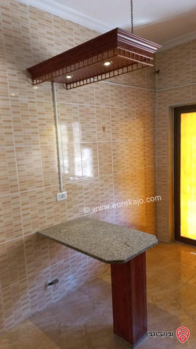 شقة طابق أرضي مساحة 130م للبيع في عمان - الجبيهة 