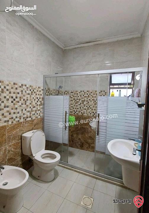 شقة شبه أرضية مساحة 133م داخلي و 140م خارجي للبيع في عمان - جبل الزهور بجانب مسجد خليل السالم