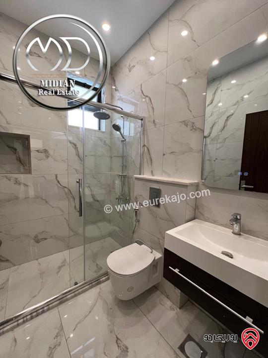 شقة ارضية جديدة للبيع في عمان - ضاحية النخيل مساحة 185م مع ترس 50م تشطيبات ديكورات فاخرة بسعر مميز