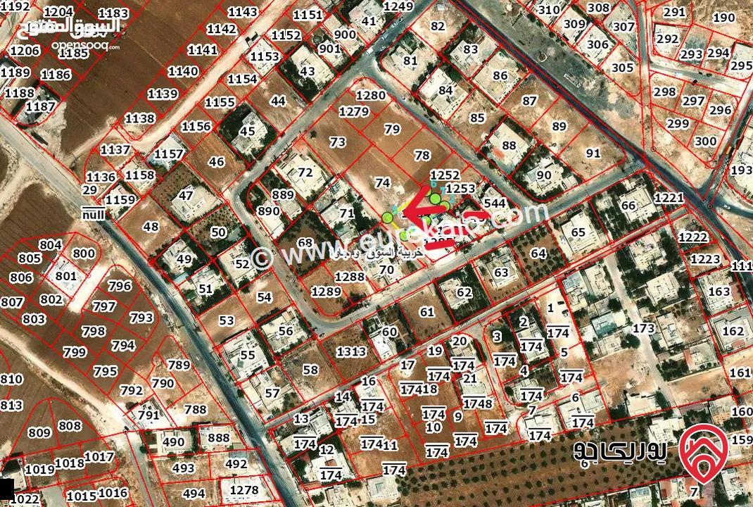 قطعة ارض مساحة 517م للبيع من أراضي جنوب عمان - خريبة السوق وجاوا على شارعين منطقة سكنية واصل كل الخدمات