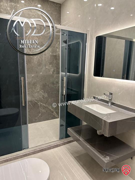 شقة شبه ارضي جديدة للبيع في عمان - ضاحية الرشيد مساحة 225م مع ترس 100م تشطيبات سوبر ديلوكس بسعر مميز 