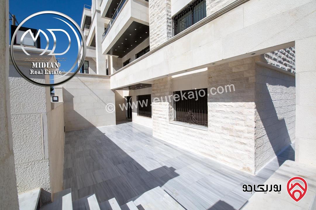 شقة شبه ارضي جديدة للبيع في عمان - خلدا العوجانية مساحة 245م مع ترس و حديقة 250م تشطيبات و ديكورات سوبر ديلوكس