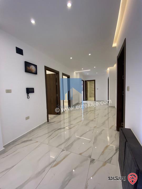 شقة أرضية 170م مع ترس 100م تشطيب سوبر ديلوكس لم تسكن للبيع في عمان - تلاع العلي