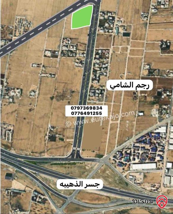 قطعة ارض مميزة مساحة 1058م على شارع 40م للسكن تتحول تجاري للبيع في عمان - رجم الشامي