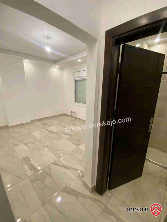 شقة فارغة طابق ثاني مساحة 90م للإيجار في عمان - الدوار السابع 