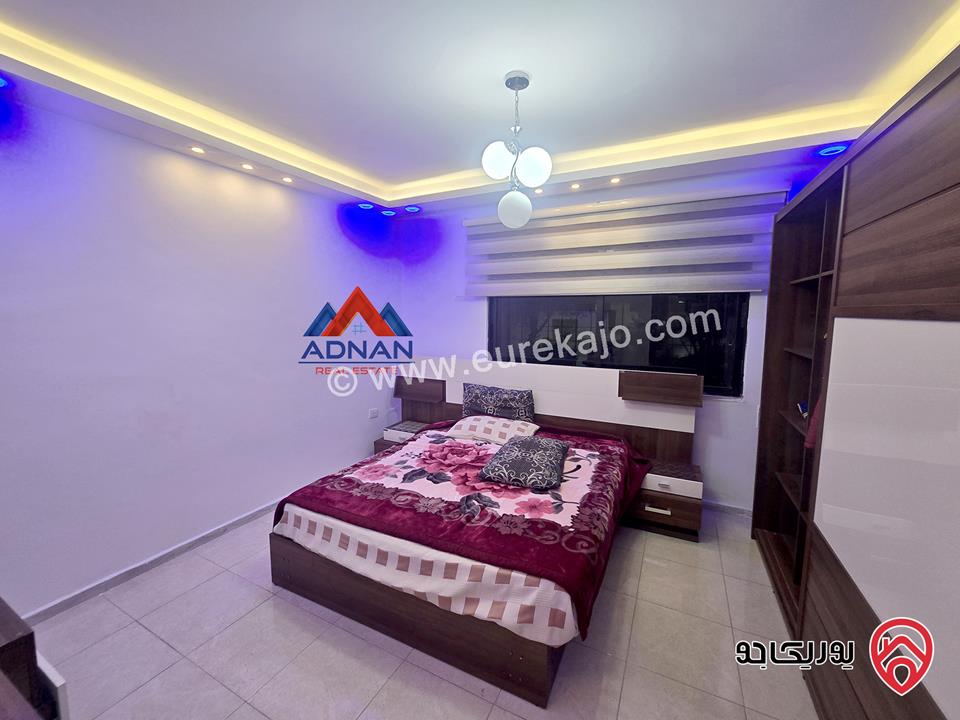 شقة أرضية مساحة 185م داخلي مع حديقة كبيرة 400م و كراج ومدخل خاص مفروشة للإيجار في عمان - الصويفية