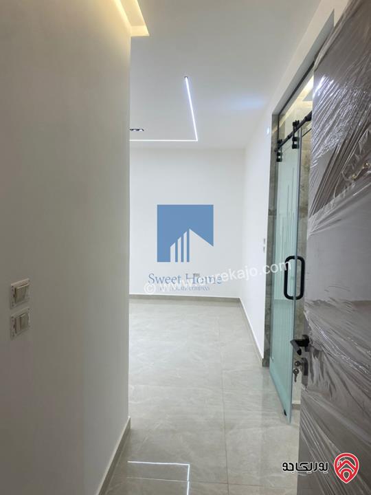 شقة أرضية فاخرة للبيع في عمان - أم أذينة قرب أبراج السادس 190م مع ترسات 130م لم تسكن