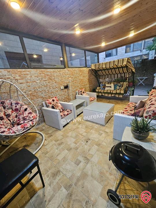 شقه طابق ارضي مساحة 150م مع حديقة 100م للبيع في عمان - الرابية 