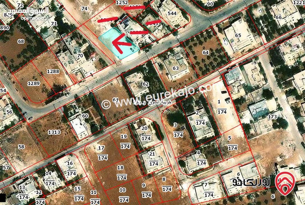 قطعة ارض مساحة 517م للبيع من أراضي جنوب عمان - خريبة السوق وجاوا على شارعين منطقة سكنية واصل كل الخدمات