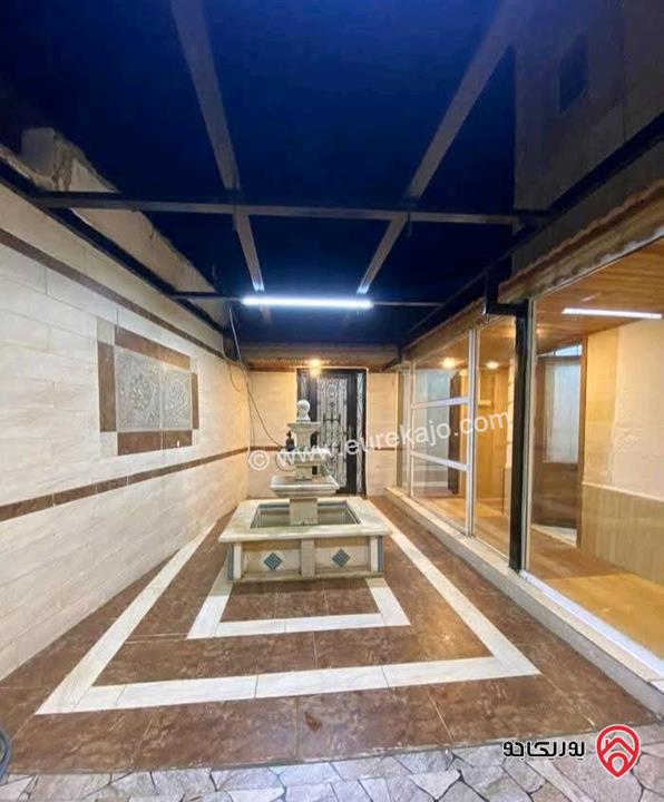 شقة فارغة أرضية مساحة 150 داخلي و 200م خارجي للايجار في عمان - دير غبار