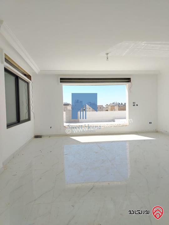 شقة فاخرة للبيع في عمان - خلدا قرب المدارس الإنجليزية طابق ثالث 280م مع روف دوبلكس 180م لم تسكن