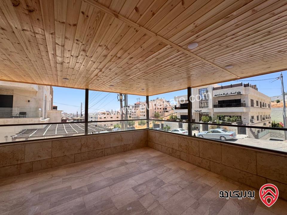شقة أرضية للبيع في عمان - خلدا مساحة البناء 200م و مساحة الترس 50م موقع مميز
