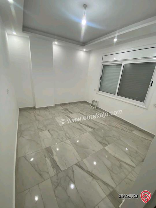 شقة فارغة طابق ثاني مساحة 90م للإيجار في عمان - الدوار السابع 