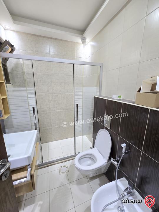 شقة ارضية مساحة 131م مع تراس 50م ومدخل خاص للبيع في عمان - الرابية 