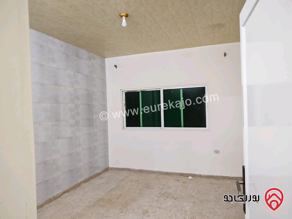 شقة طابق أول مساحة 87م للايجار في اربد غرب نفق الجامعة 