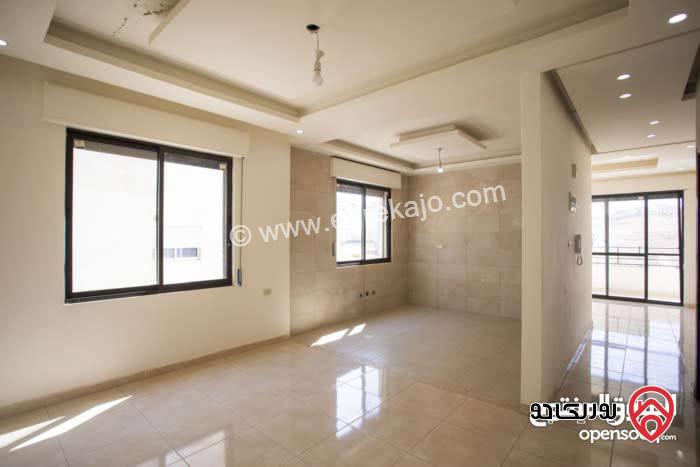 اخر شقة في المشروع طابق ثالث مع روف مبني مرخص مساحة 135م للبيع في عمان - ابو علندا 