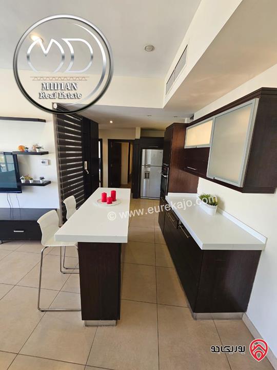 شقة مفروشة للايجار في عمان - عبدون مساحة 90م طابق ثاني تشطيبات و ديكورات فندقية فرش فاخر اطلالة جميلة