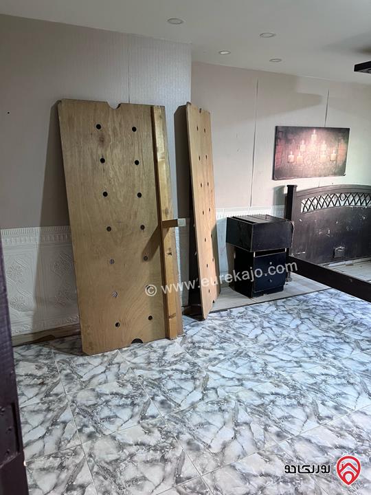 شقة شبه أرضية مساحة 100م داخلي و 100م خارجي للبيع في عمان - الجبيهة 