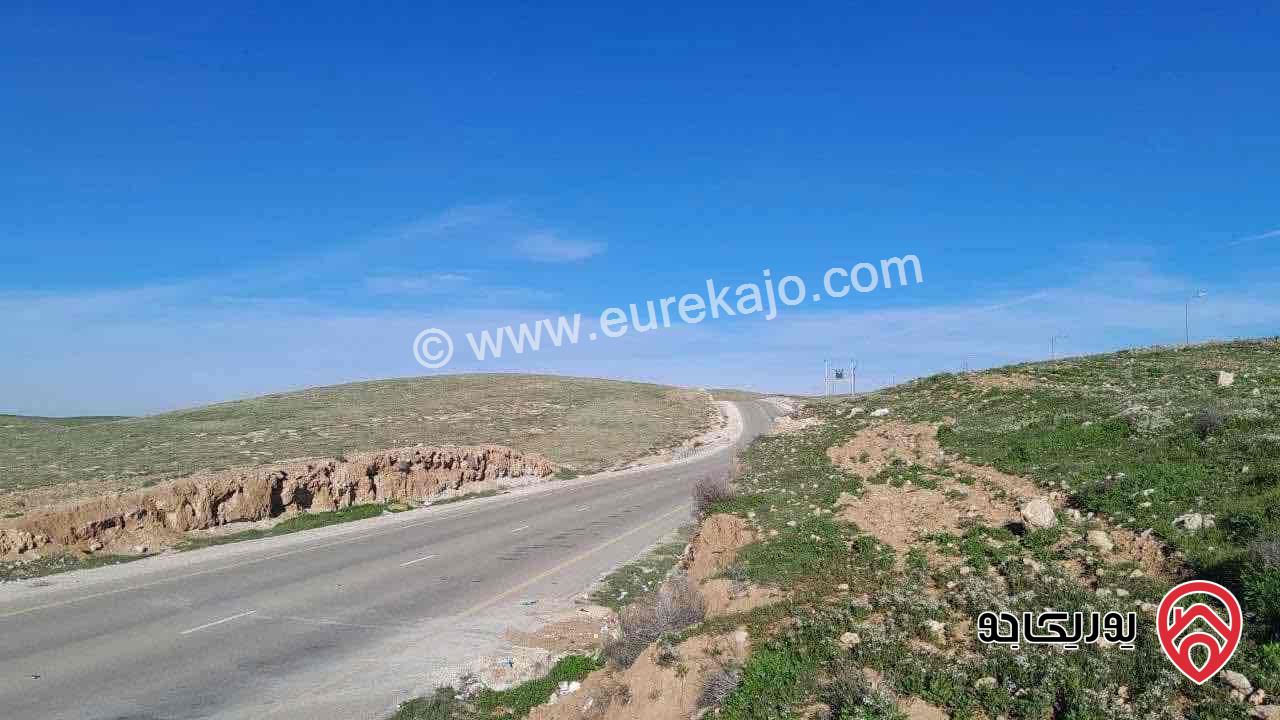 أرض مساحة 68 دونم للبيع في عمان - الخشافيه على شارع المية التنموي 