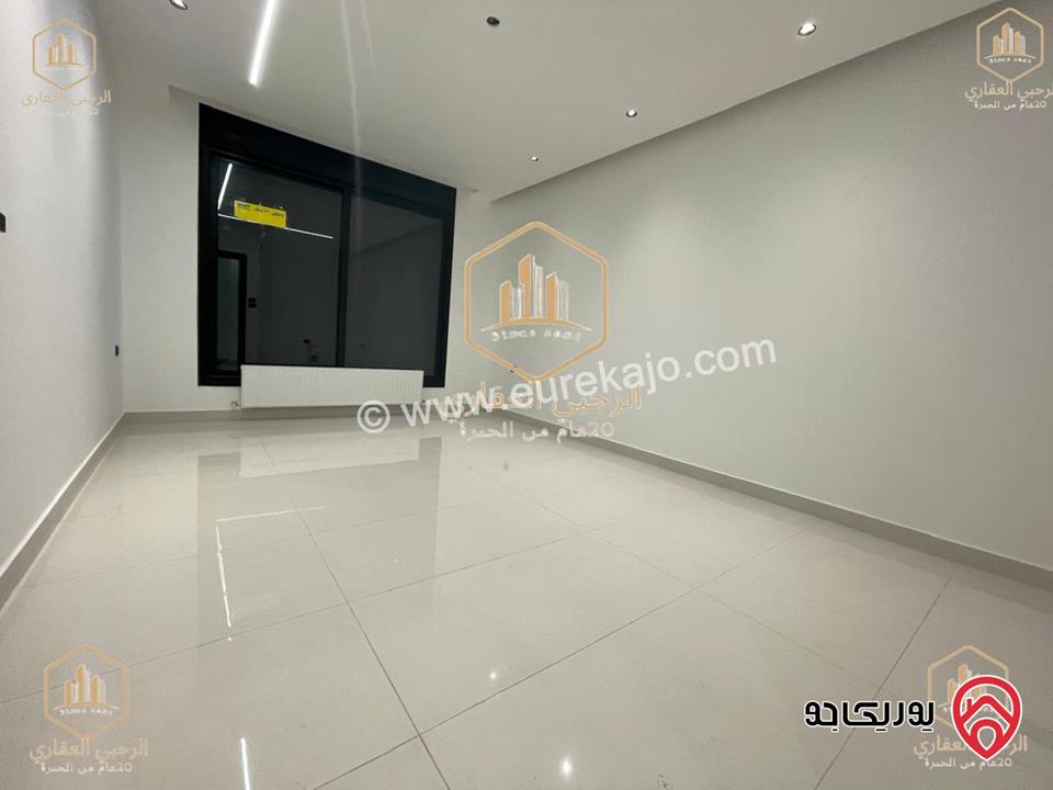 شقة ارضية مساحة 145م مع ترس خارجي 135م للايجار في عمان - الجندويل