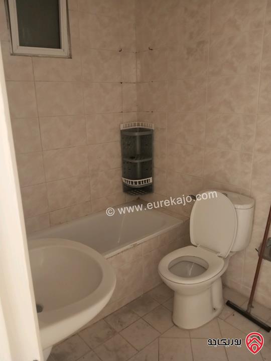 شقة طابق أول مساحة 140م للبيع في اربد غرب مسجد علياء التل