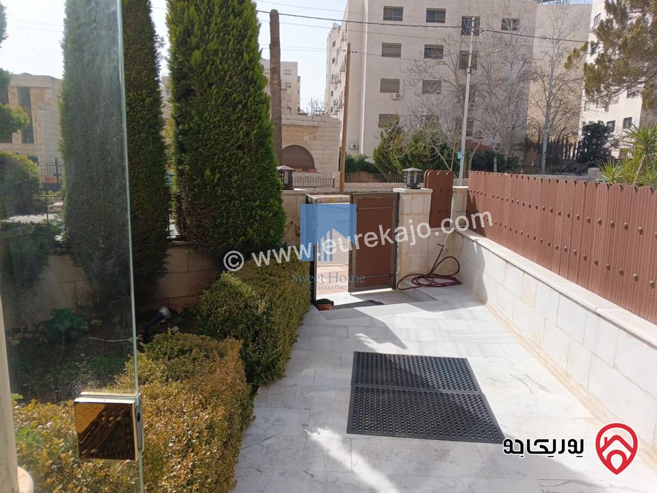 شقة أرضية مميزة مساحة 215م مع حديقة وترسات 120م للبيع في عمان - خلدا