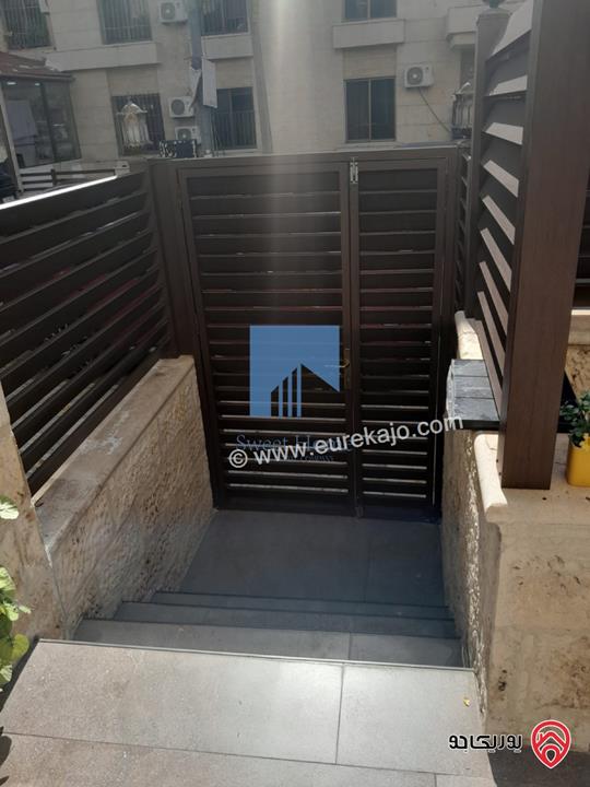 شقة أرضية مفروشة فاخرة للبيع في عمان - السابع قرب السفارة الرومانية 185م مع ترس امامي 25م تشطيب سوبر ديلوكس