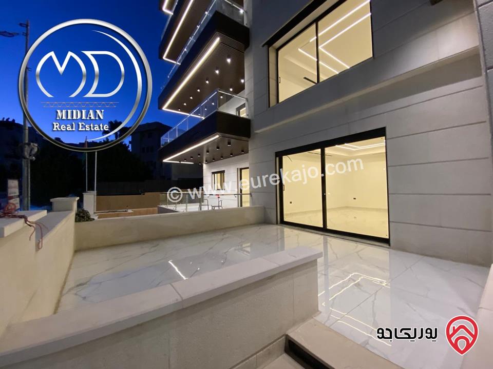 شقق شبه ارضي جديدة للبيع في عمان - الجاردنز مساحات 235م & 275م مع تراسات و حدائق تشطيبات ديكورات عصرية فاخرة