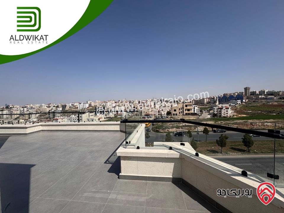 روف مساحة 220م داخلي والترس 220م موقع مميز ومطل للبيع في عمان - رجم عميش