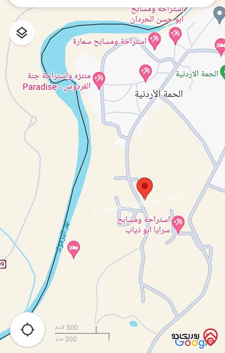 قطعة أرض مساحة 405م للبيع في اربد من اراضي بني كنانة الحمه الاردنية منطقة المسابح والاستراحات