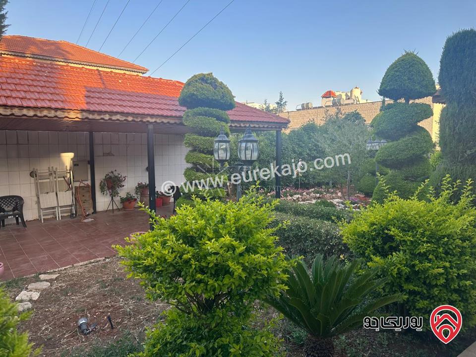 أرض سكنية مساحة 840م عليها منزل 217م للبيع في عمان - الجندويل