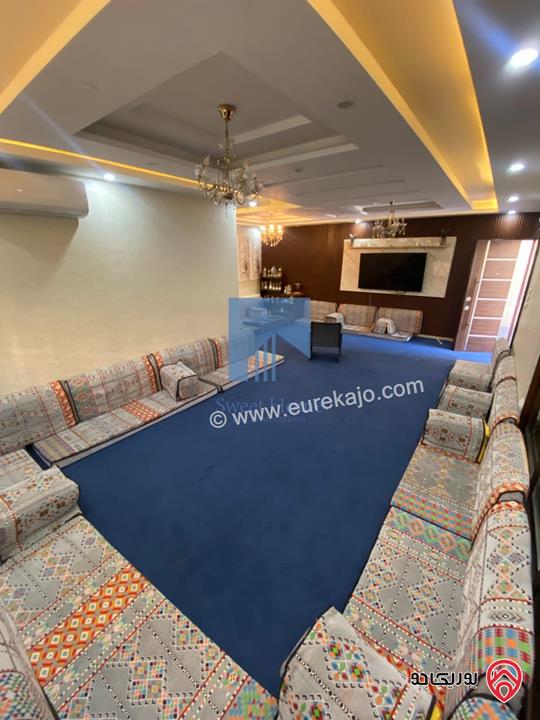 شقة أرضية مفروشة فاخرة للبيع في عمان - أم السماق مساحة 245م مع حديقة وترسات 120م
