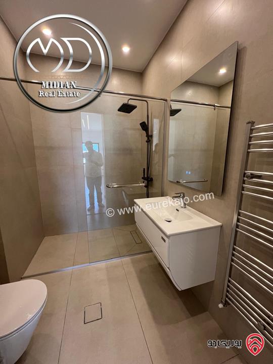 شقة دوبلكس جديدة طابق أخبر مع روف للبيع في عمان - حي الصحابة مساحة 215م مع تراسات اطلالة رائعة بسعر مميز