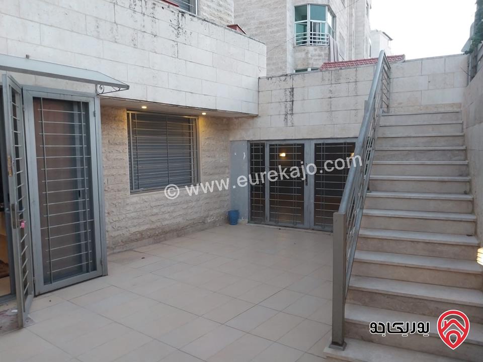 شقه للايجار في عمان - الدوار السابع مساحة 80م + 130م شبه ارضي قرب الترخيص