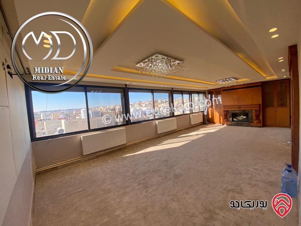 شقة للايجار طابق أخير مع روف في عمان - خلدا - العوجانية مساحة 425م مع تراسات تشطيبات ديكورات فاخرة اطلالة بانورامية خلابة