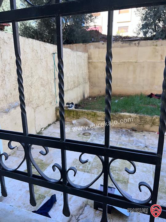 شقة شبه أرضية مساحة 100م داخلي و 100م خارجي للبيع في عمان - الجبيهة 