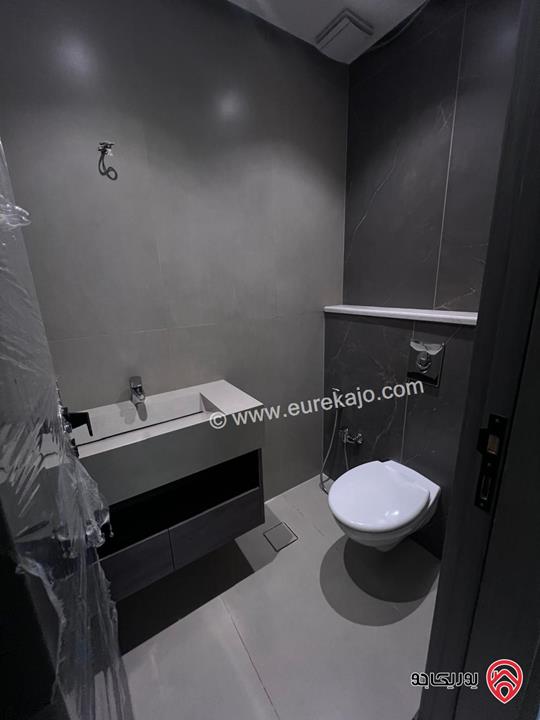 شقة جديدة طابق أول مساحة 150م للبيع في عمان - أم آذينة