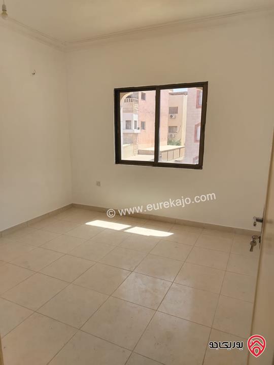 شقة طابق أول مساحة 100م للبيع في العقبة بسعر مميز 