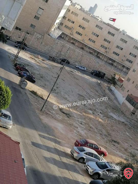 قطعة ارض مساحة 1 دونم على شارعين للبيع في عمان - المدينة الرياضية بجانب حراج الأردن 