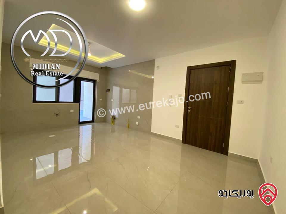 شقة شبه ارضي جديدة للبيع في عمان - تلاع العلي مساحة 200م مع ترس و حديقة 150م تشطيبات سوبر ديلوكس بسعر مميز جداً