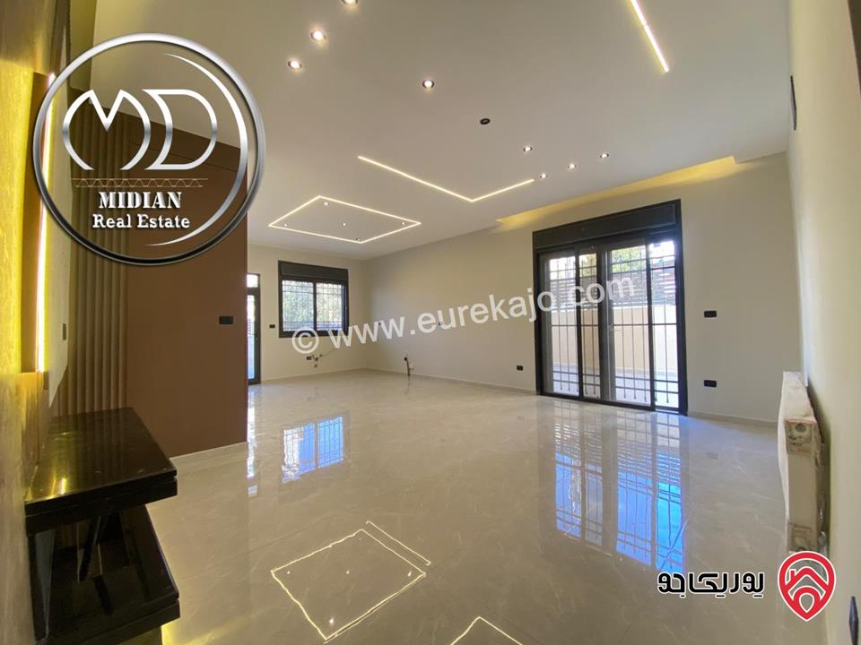 شقة ارضية جديدة للبيع في عمان - تلاع العلي مساحة 210م مع ترس و حديقة 140م تشطيبات ديكورات عصرية فاخرة بسعر مميز