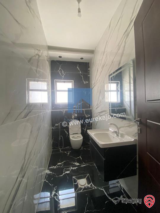 شقة أرضية فاخرة مساحة 200م مع ترس 10م لم تسكن للبيع في عمان - تلاع العلي