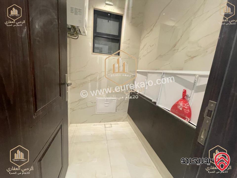 شقة ارضية مساحة 145م مع ترس خارجي 135م للايجار في عمان - الجندويل