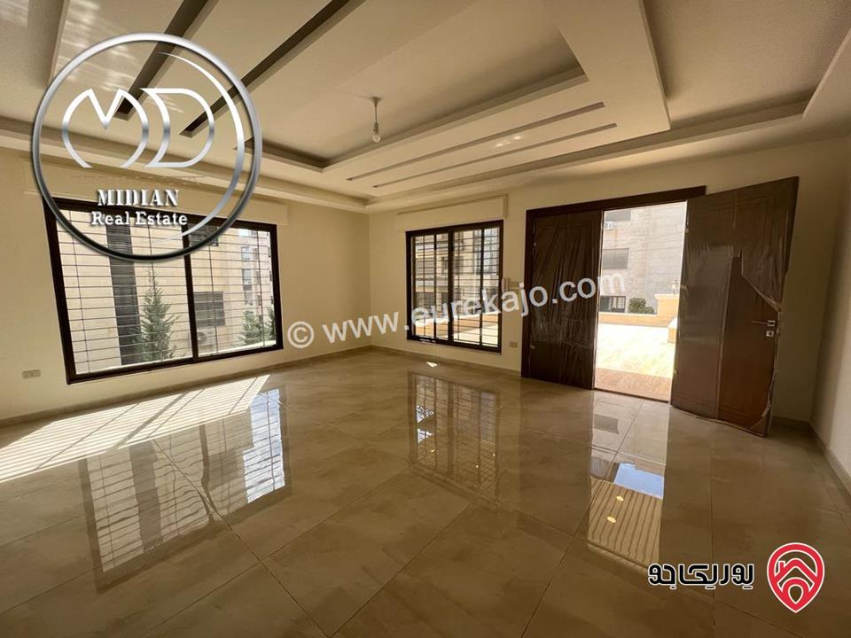 شقة أرضية جديدة للبيع في عمان - خلدا العوجانية مساحة 200م مع ترس و حديقة 150م تشطيبات ديكورات عصرية فاخرة بسعر مميز