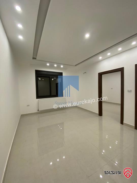 شقة أرضية فاخرة للبيع في عمان - الجندويل قرب المتصرفية 170م مع ترس 50م لم تسكن بسعر مغري